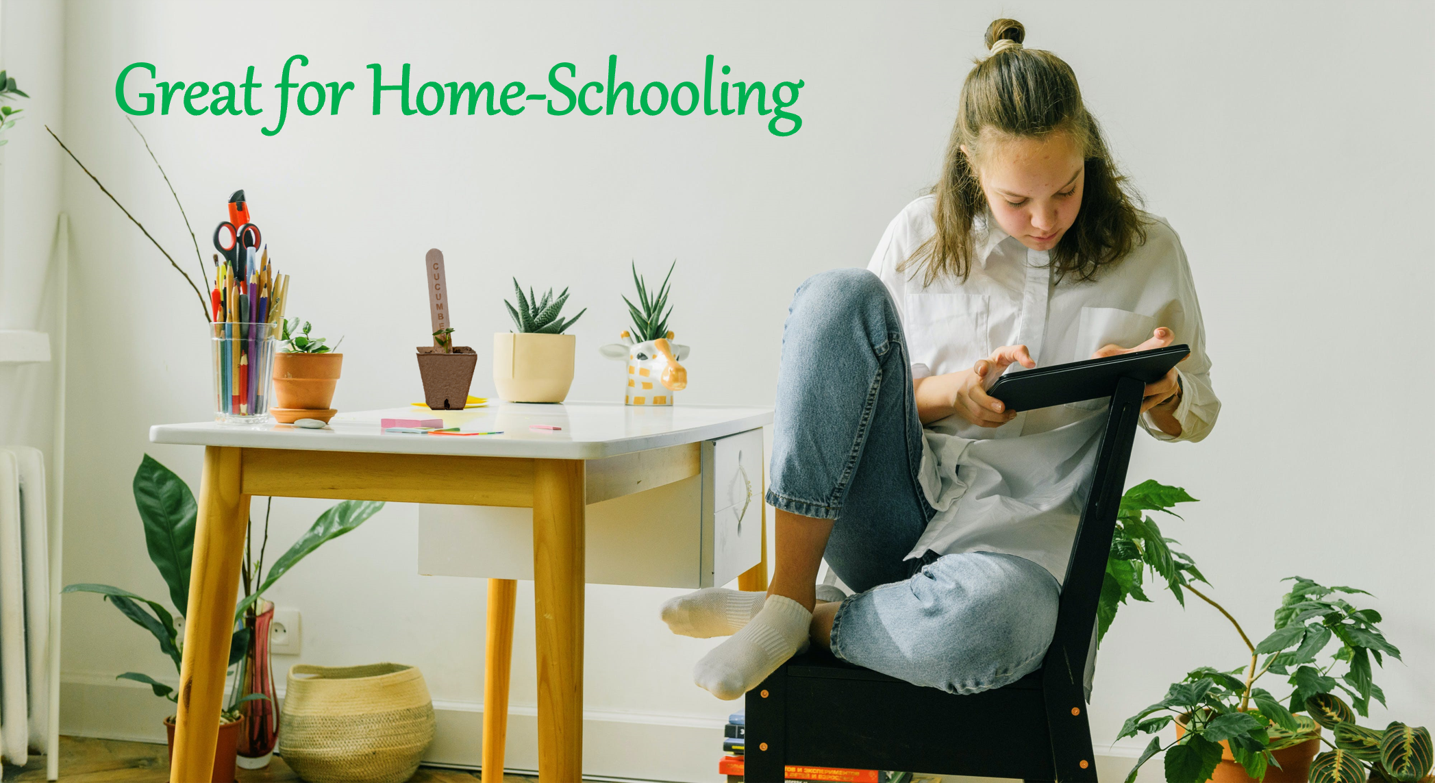 girl sitting on a chair with plants on a desk homeschooling